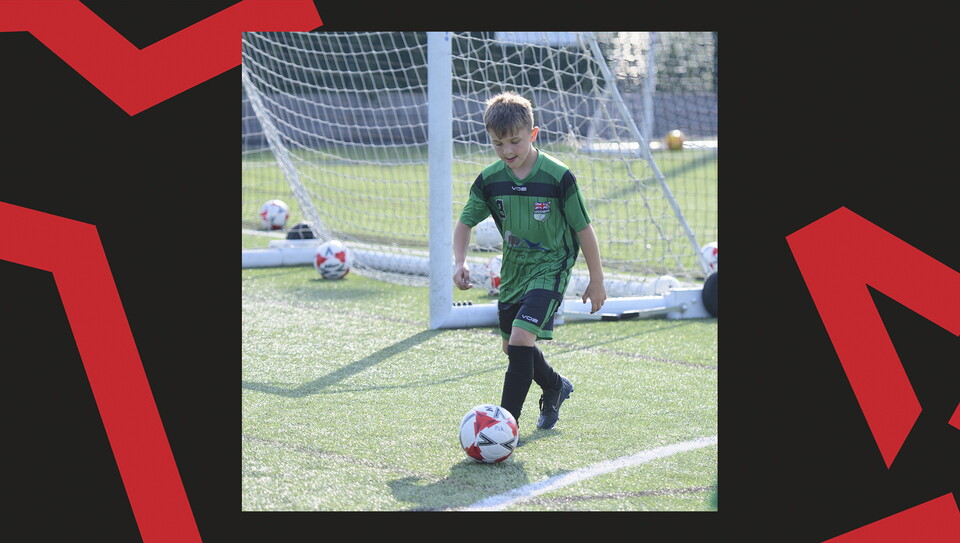 Young fans enjoying a matchday experience at Lincoln City's home game against Wigan Athletic.