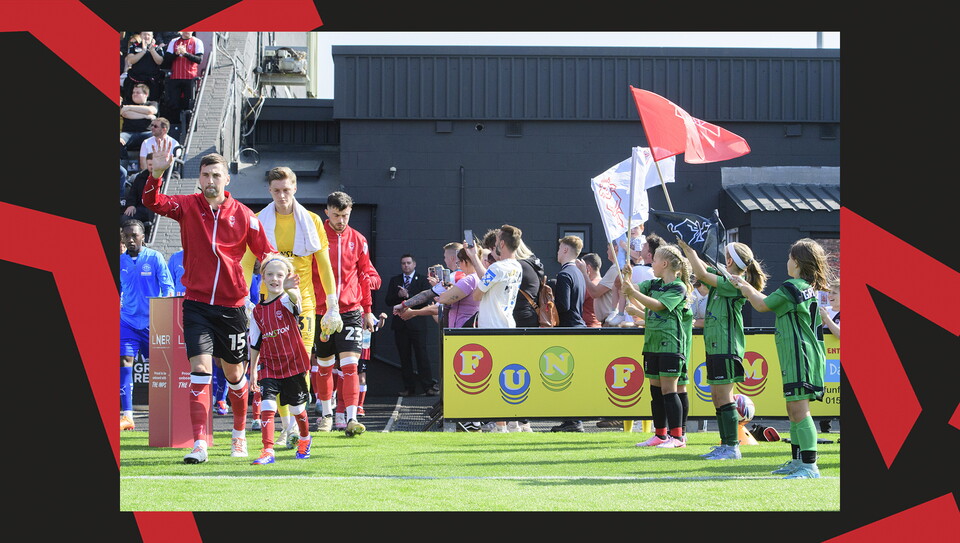 Young fans enjoying a matchday experience at Lincoln City's home game against Wigan Athletic.