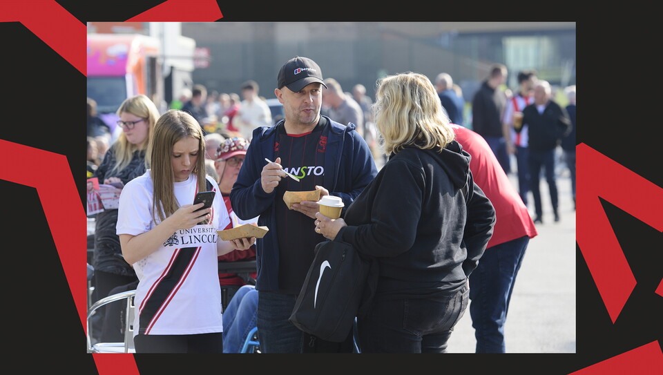 An image of supporters from Lincoln City's 0-0 home draw against Wigan Athletic.