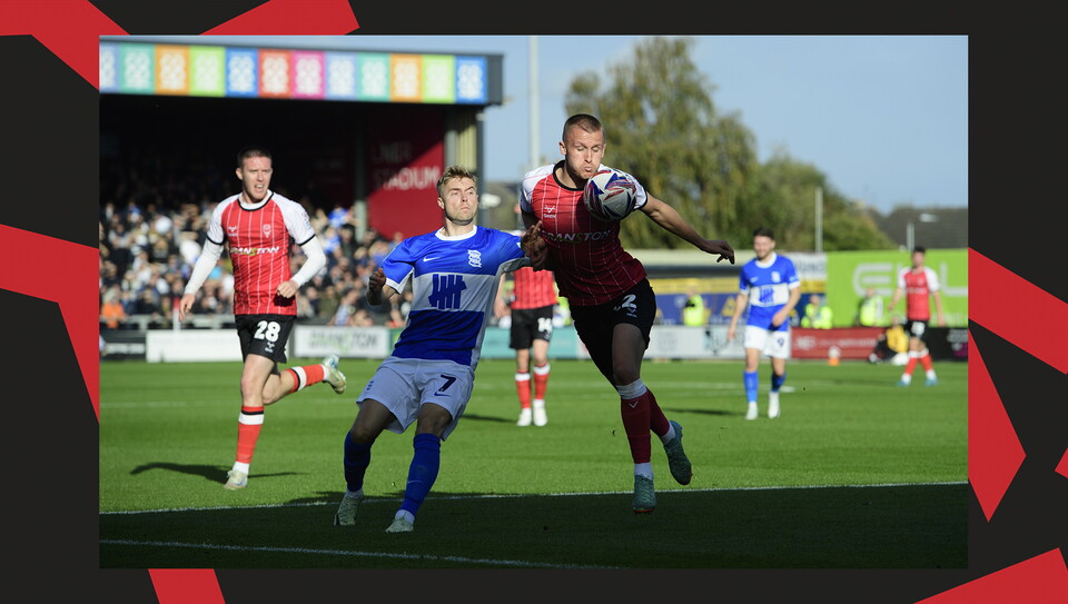 A match action image from the Imps' game against Birmingham City.