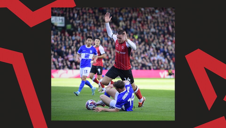 A match action image from the Imps' game against Birmingham City.