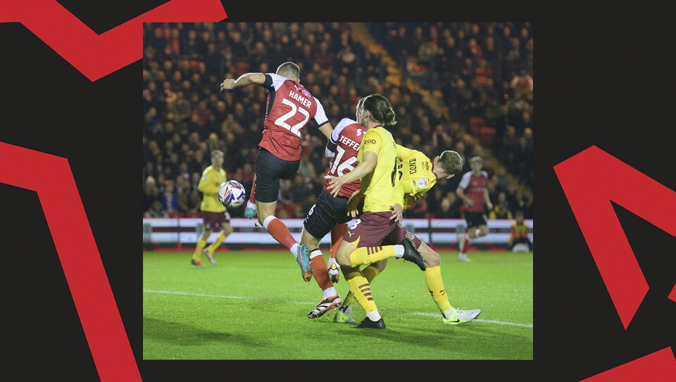 A match action image from Lincoln City's 2-1 home win over Northampton Town