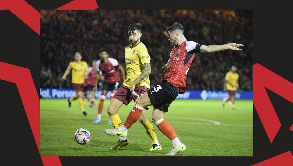 A match action image from Lincoln City's 2-1 home win over Northampton Town