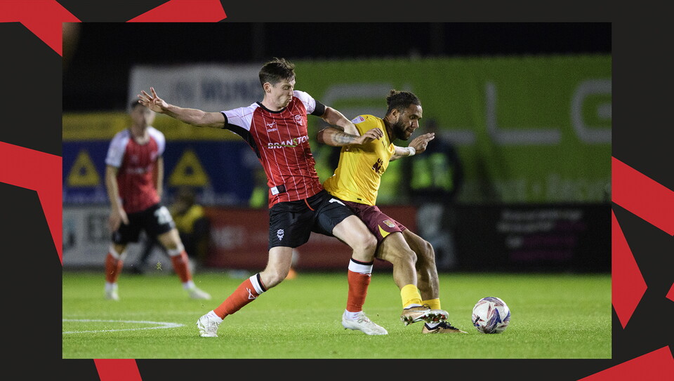A match action image from Lincoln City's 2-1 home win over Northampton Town