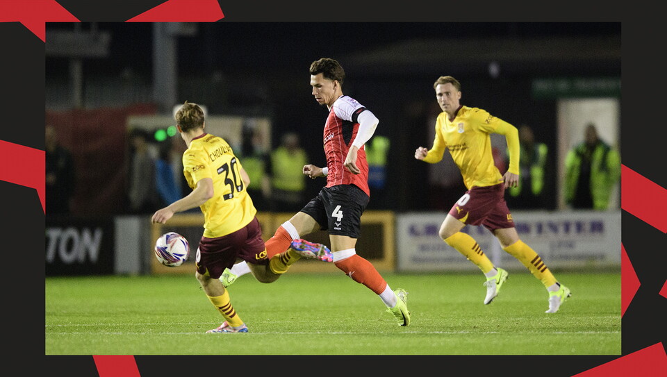 A match action image from Lincoln City's 2-1 home win over Northampton Town