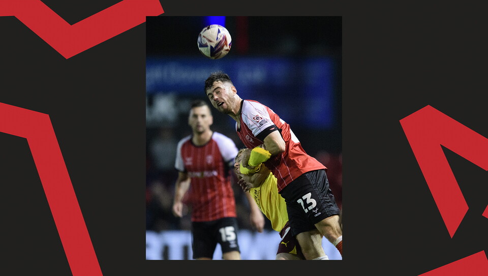A match action image from Lincoln City's 2-1 home win over Northampton Town