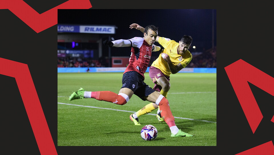 A match action image from Lincoln City's 2-1 home win over Northampton Town
