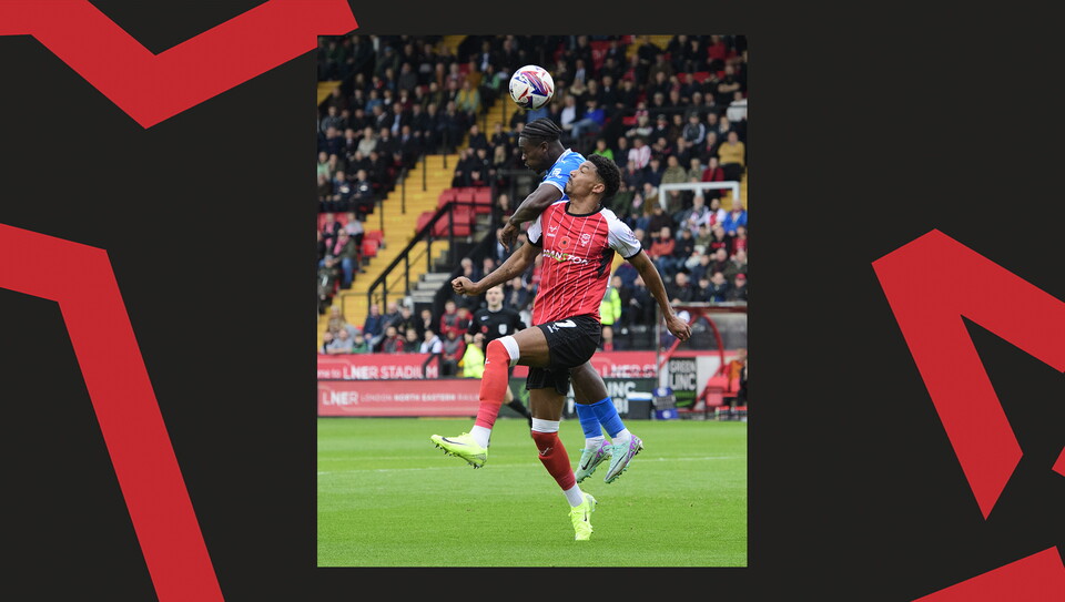A match action image from Lincoln City's 2-1 home win over Stockport County.