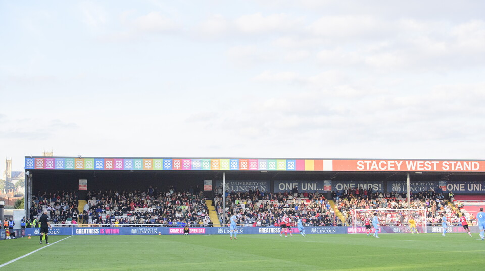 A wide image of the Stacey West Stand at the LNER Stadium. The stand is full with 900 children, parents and coaches from grassroots teams.