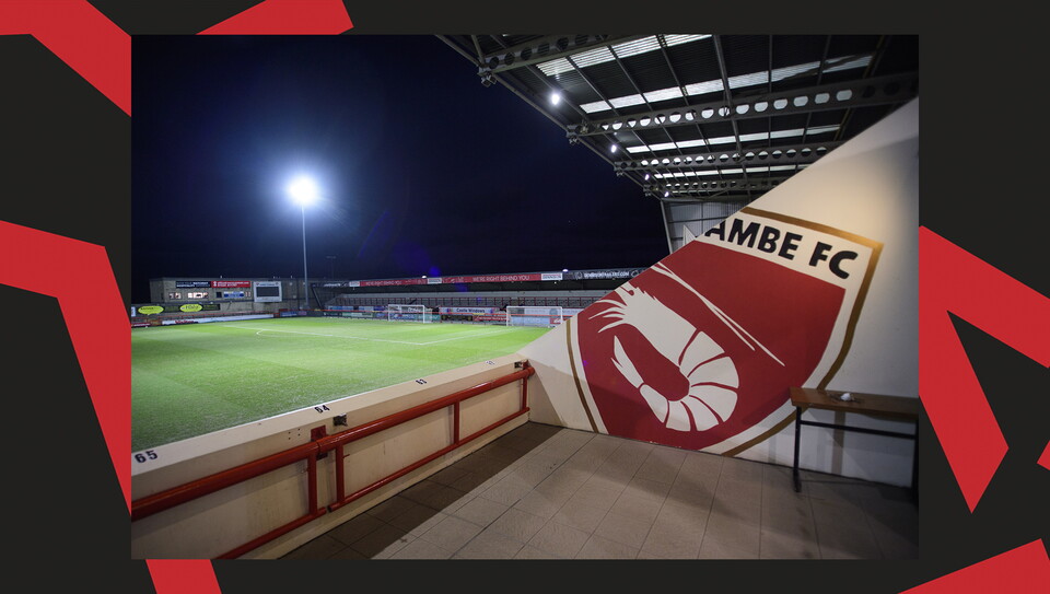 A match action image from the Imps' away Vertu Trophy game at Morecambe