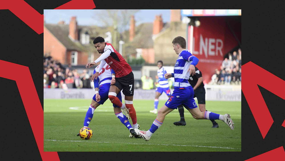 Match action from Lincoln CIty's 2-0 win over Reading.