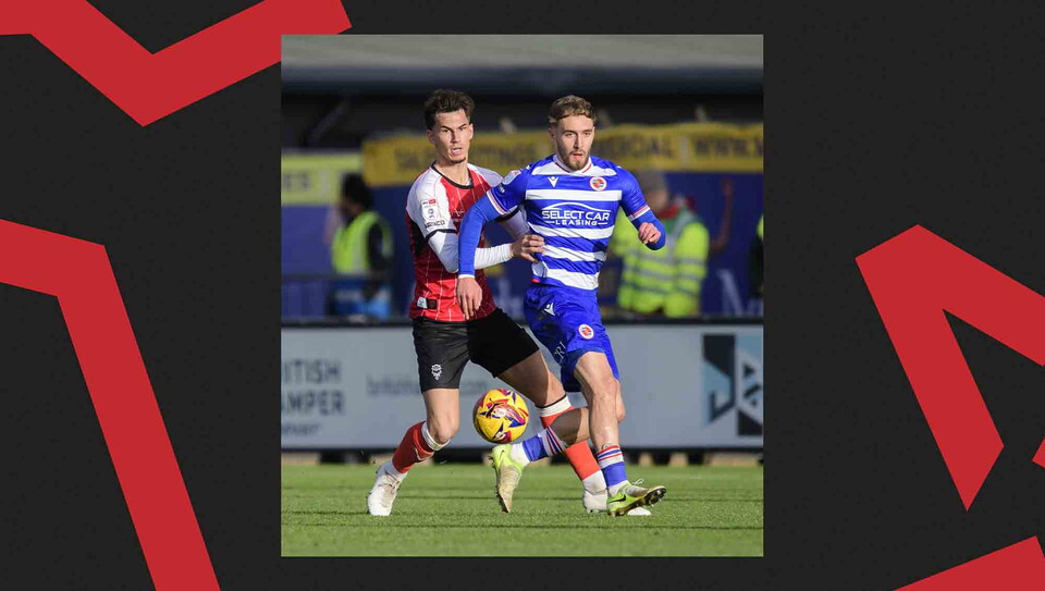Match action from Lincoln CIty's 2-0 win over Reading.
