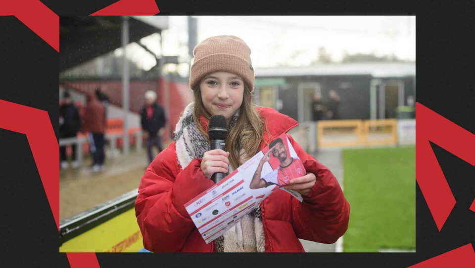 Fans pose for a photo before the game.