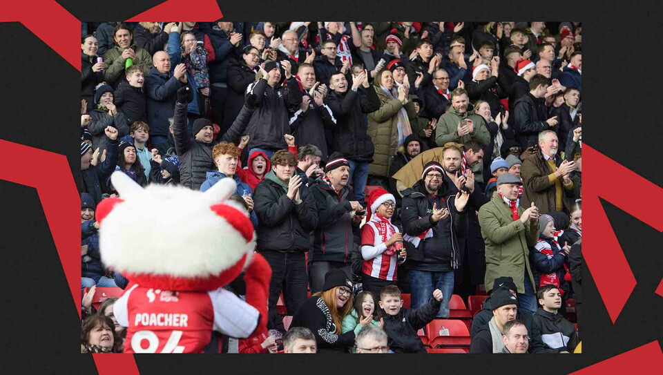 Lincoln CIty fans watching a game