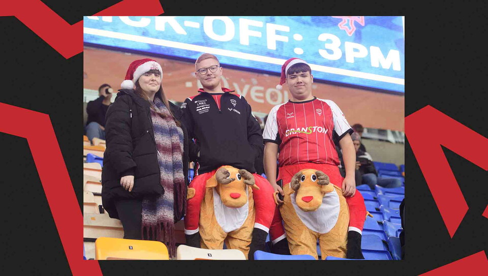 Lincoln City supporters back their team at Shrewsbury Town.
