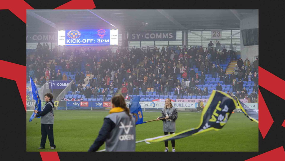 Lincoln City supporters back their team at Shrewsbury Town.