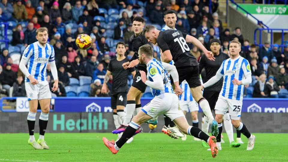 Ben House heads home City's opener against Huddersfield Town