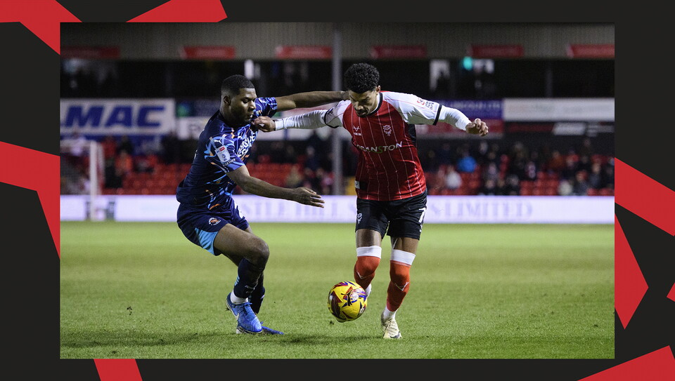 A match action image from City's home game against Blackpool at the LNER Stadium.