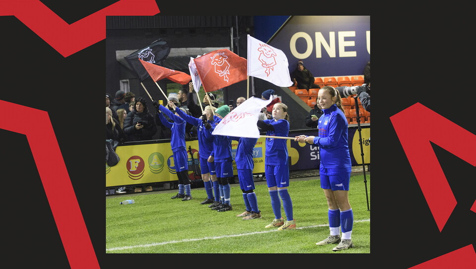 A matchday experience image from Lincoln City's home game against Blackpool.