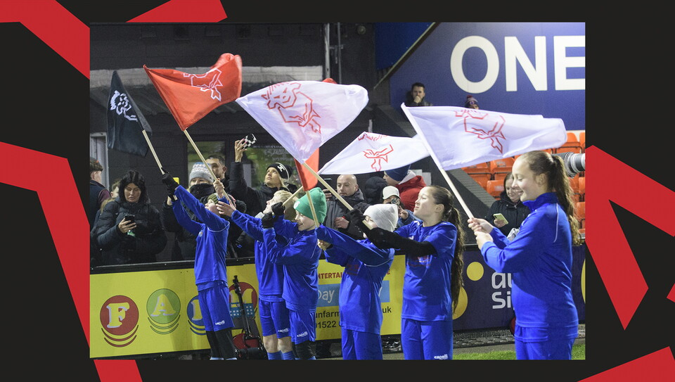 A matchday experience image from Lincoln City's home game against Blackpool.