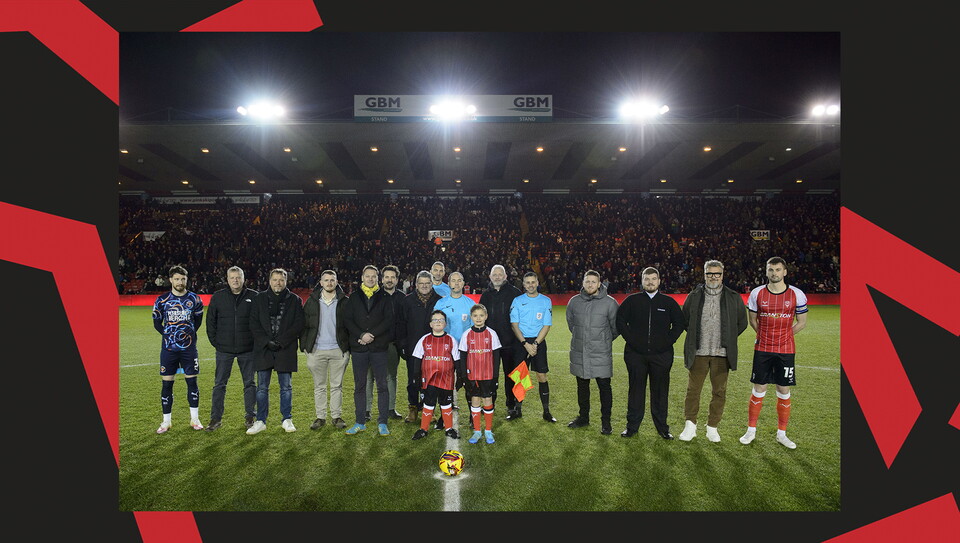 A matchday experience image from Lincoln City's home game against Blackpool.