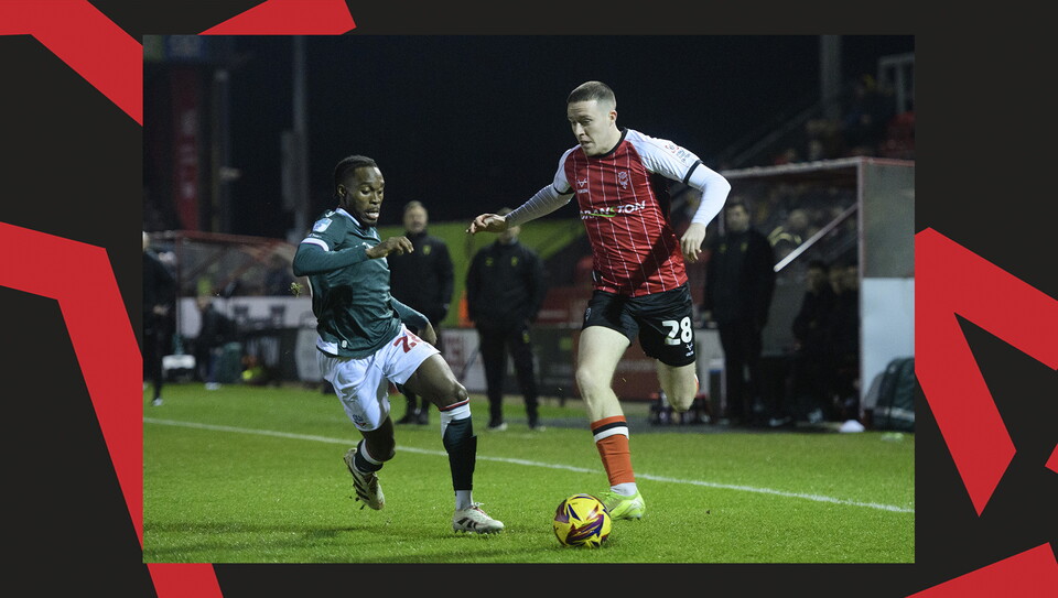 A match action image from Lincoln's home game against Bolton Wanderers