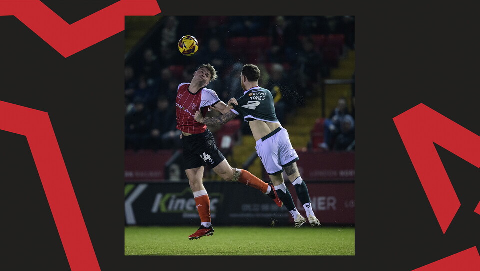 A match action image from Lincoln's home game against Bolton Wanderers