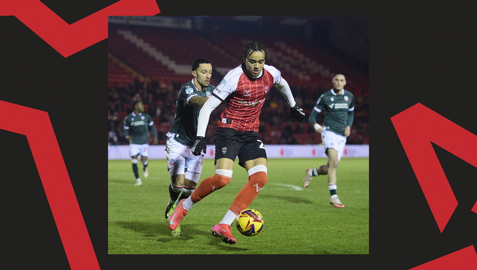 A match action image from Lincoln's home game against Bolton Wanderers