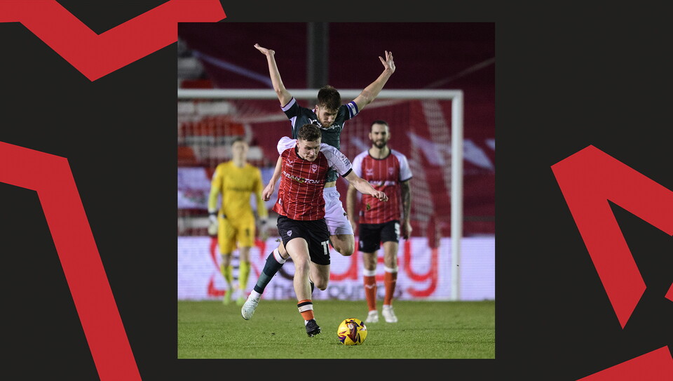A match action image from Lincoln's home game against Bolton Wanderers