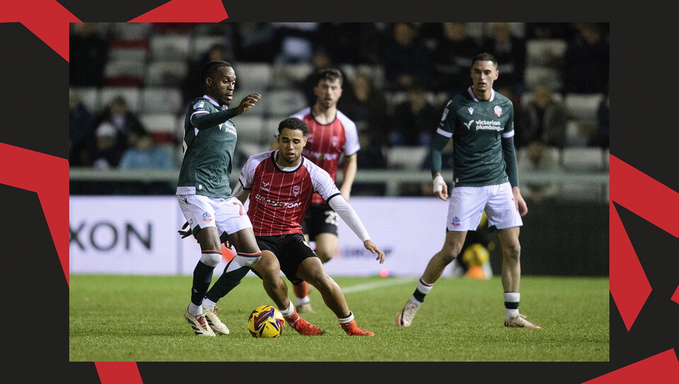 A match action image from Lincoln's home game against Bolton Wanderers