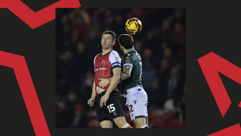 A match action image from Lincoln's home game against Bolton Wanderers