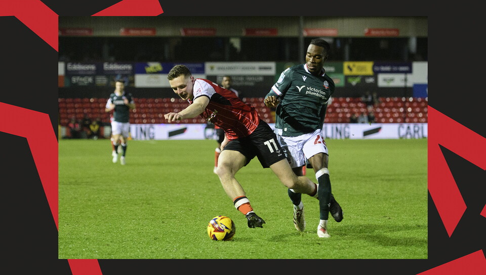 A match action image from Lincoln's home game against Bolton Wanderers