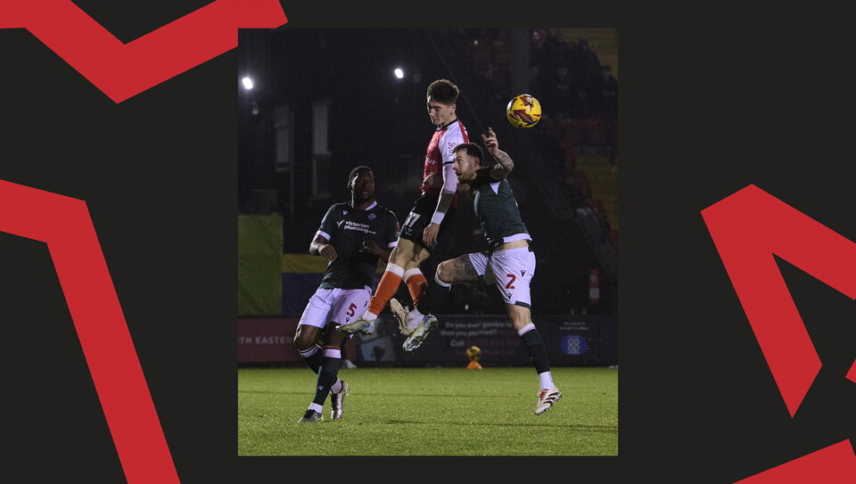 A match action image from Lincoln's home game against Bolton Wanderers