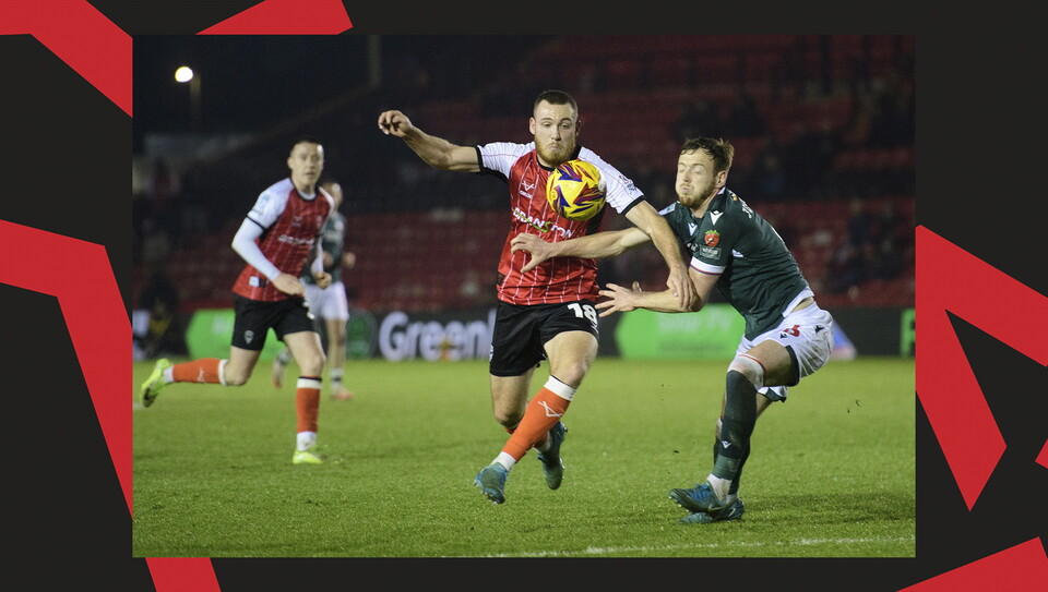 A match action image from Lincoln's home game against Bolton Wanderers