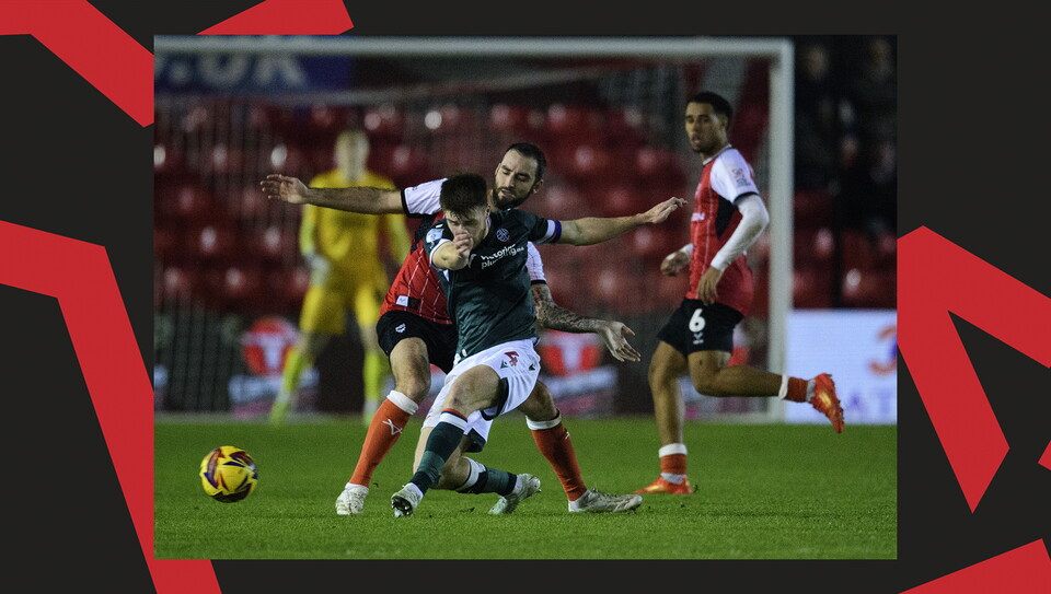 A match action image from Lincoln's home game against Bolton Wanderers