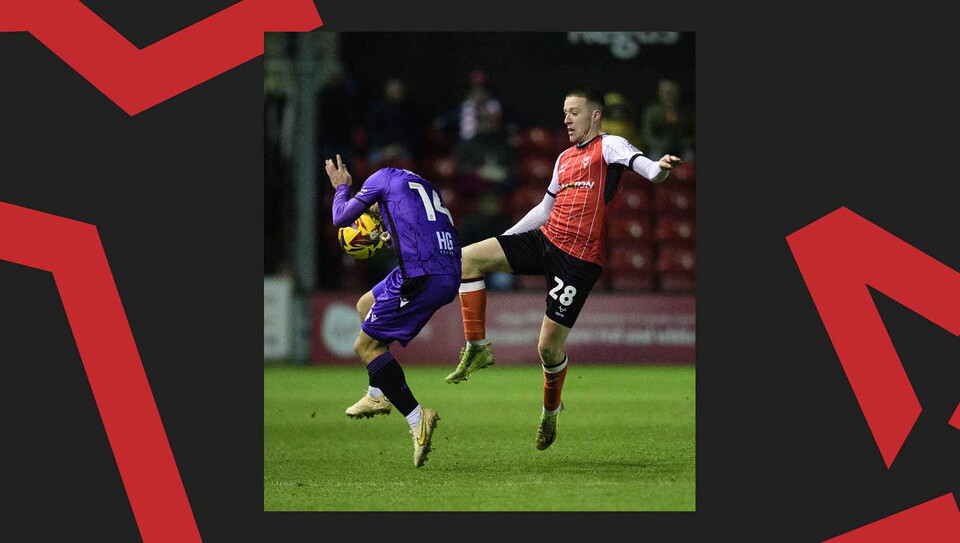 A match action image from Lincoln's 0-0 home draw against Stevenage.