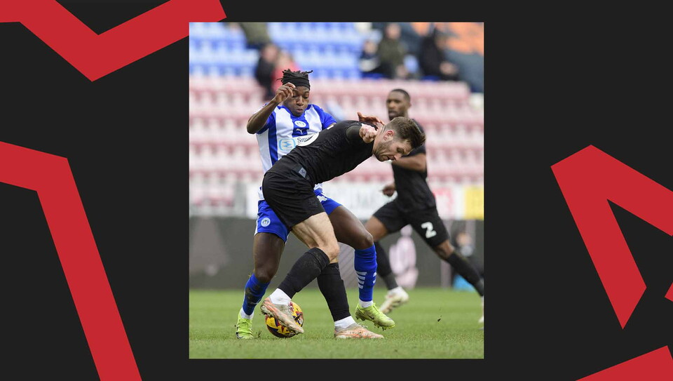 A match action image from City's away game at Wigan Athletic.