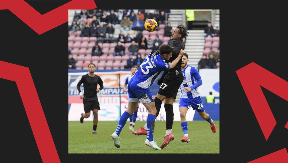 A match action image from City's away game at Wigan Athletic.