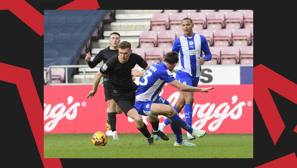 A match action image from City's away game at Wigan Athletic.