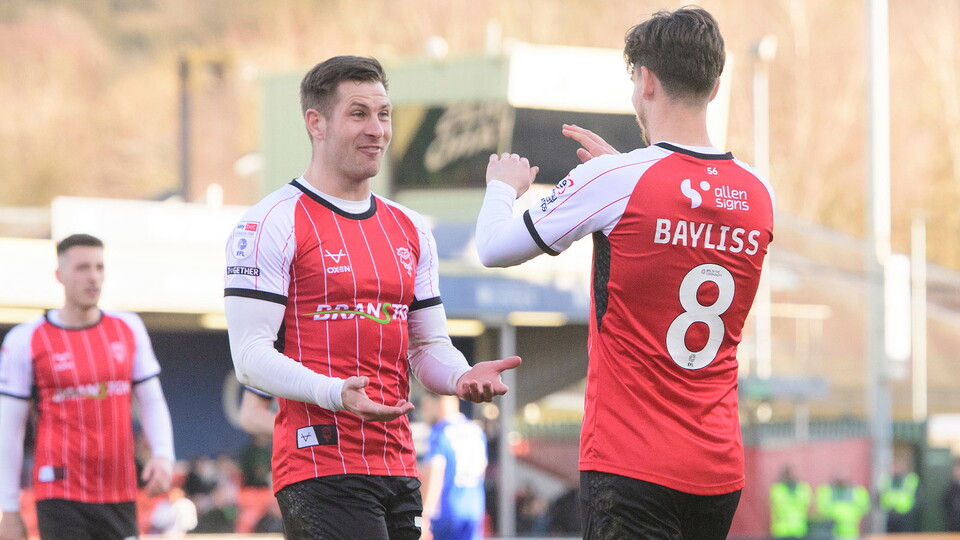 James Collins and Tom Bayliss celebrate during City's 5-0 win over Bristol Rovers