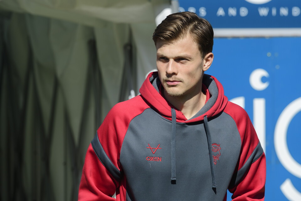 Erik Ring looks to his right after walking out of the tunnel at Adams Park