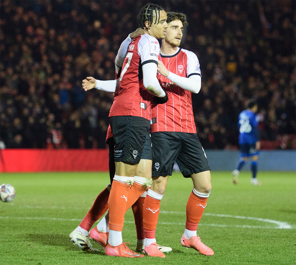 Jovon Makama and Tom Bayliss celebrate City's second goal