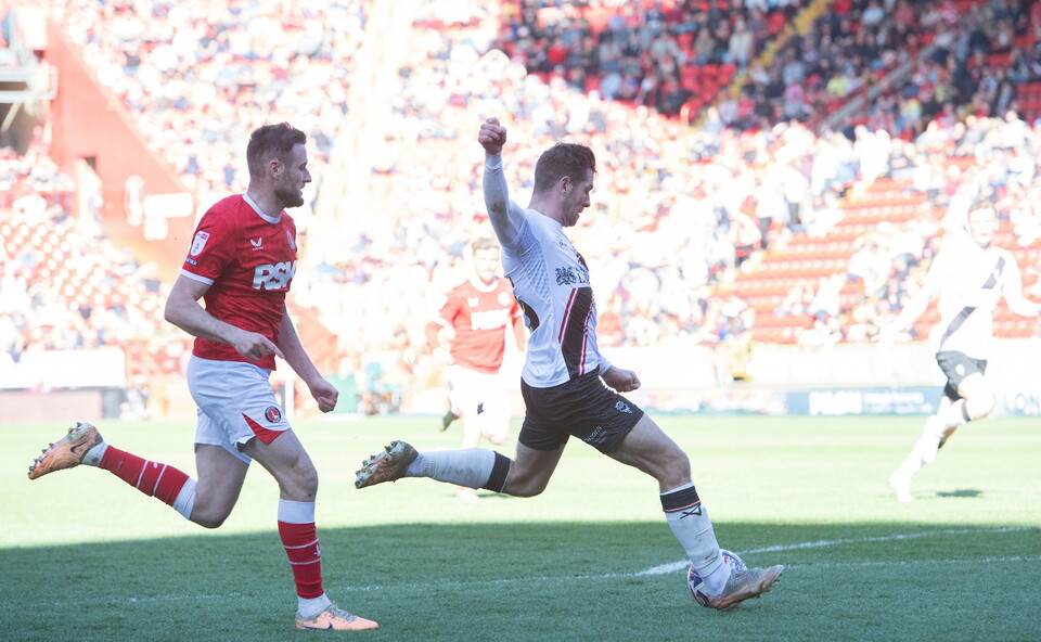 James Collins converting his second goal of the game at The Valley.