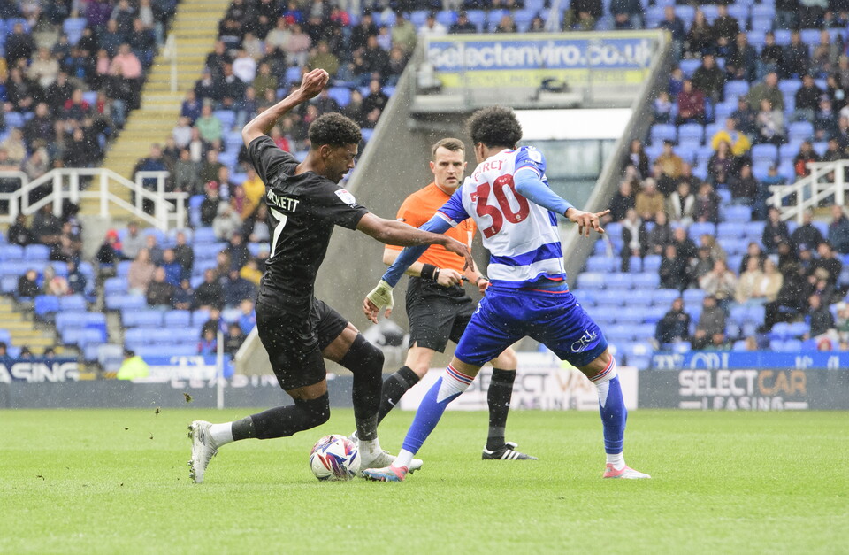 Reeco Hackett turns inside Andre Garcia before getting a shot away.