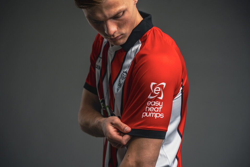 Erik Ring pulls down a sleeve on his shirt