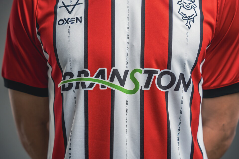 A close up of the Lincoln City home shirt