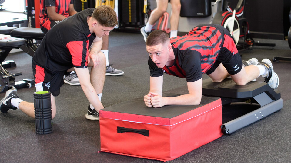 Jack Moylan does an exercise