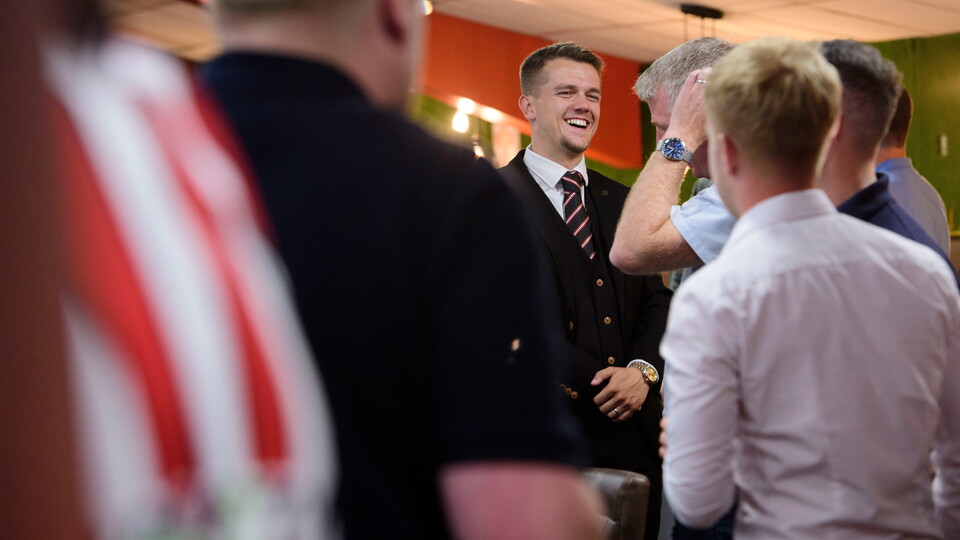 Guests enjoy Lincoln CIty's fixture launch event.