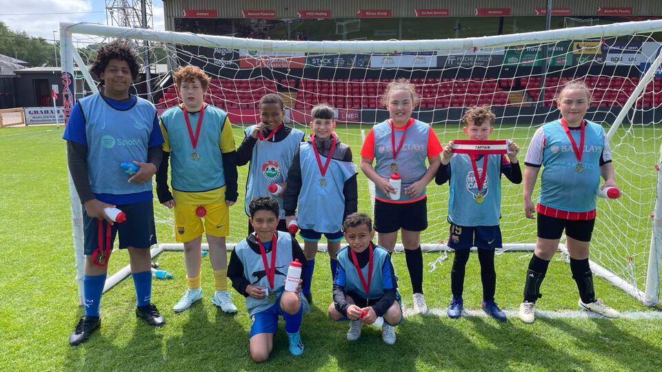 A group photo of participants in the children's community world cup