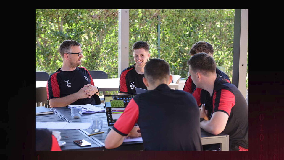 Lincoln City staff sit at a table